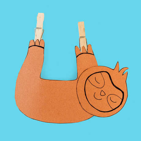 Kids' craft of a sloth made of clothespins
