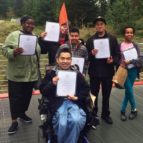 Proud graduates of the Academy ARC program pose with their diplomas